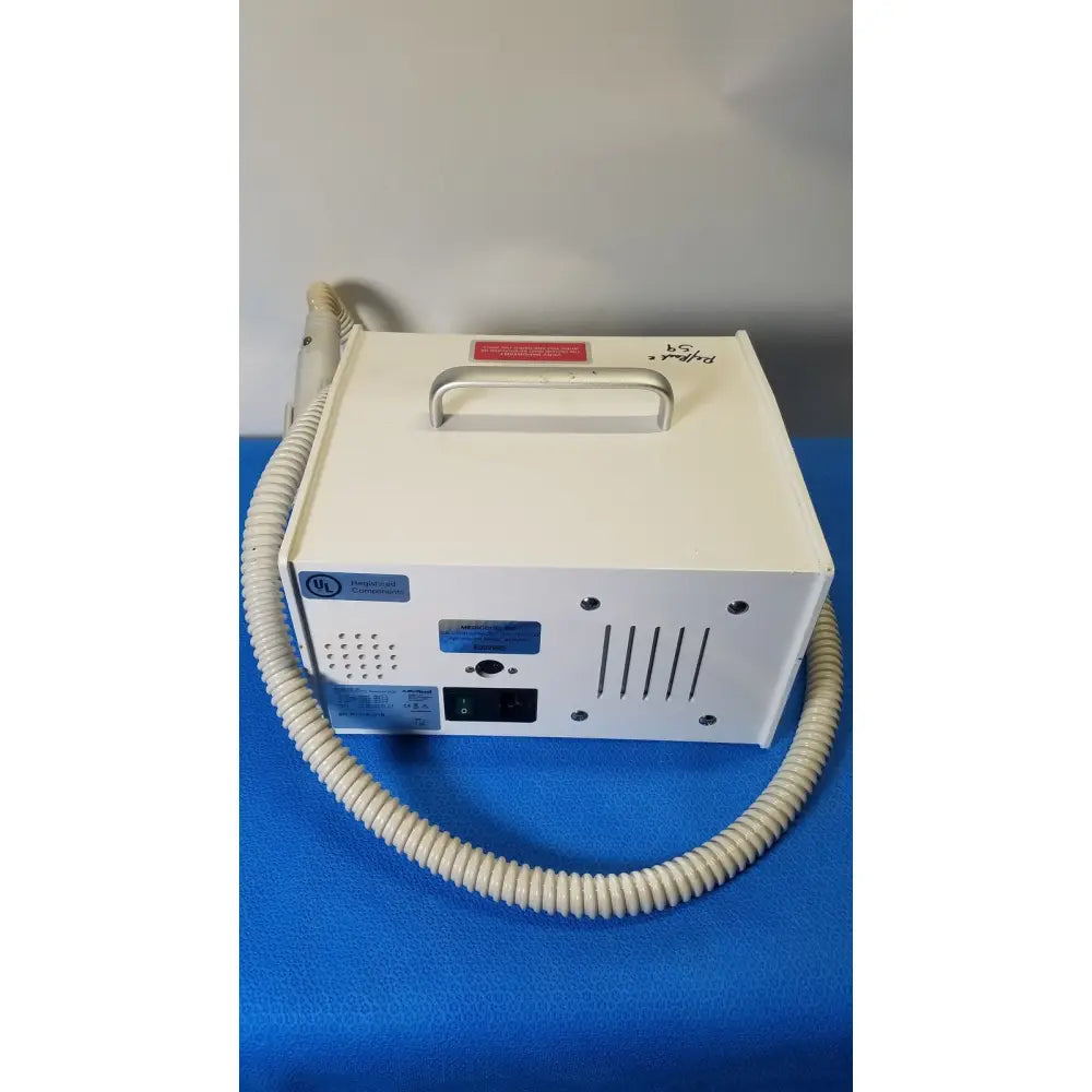 White rectangular medicool pro vac file v2 dust collector vacuum system with beige coiled hose and control panels