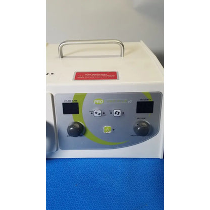 Medicool pro vac file v2 dust collector vacuum system with white body silver handle and gray control panel with green accents