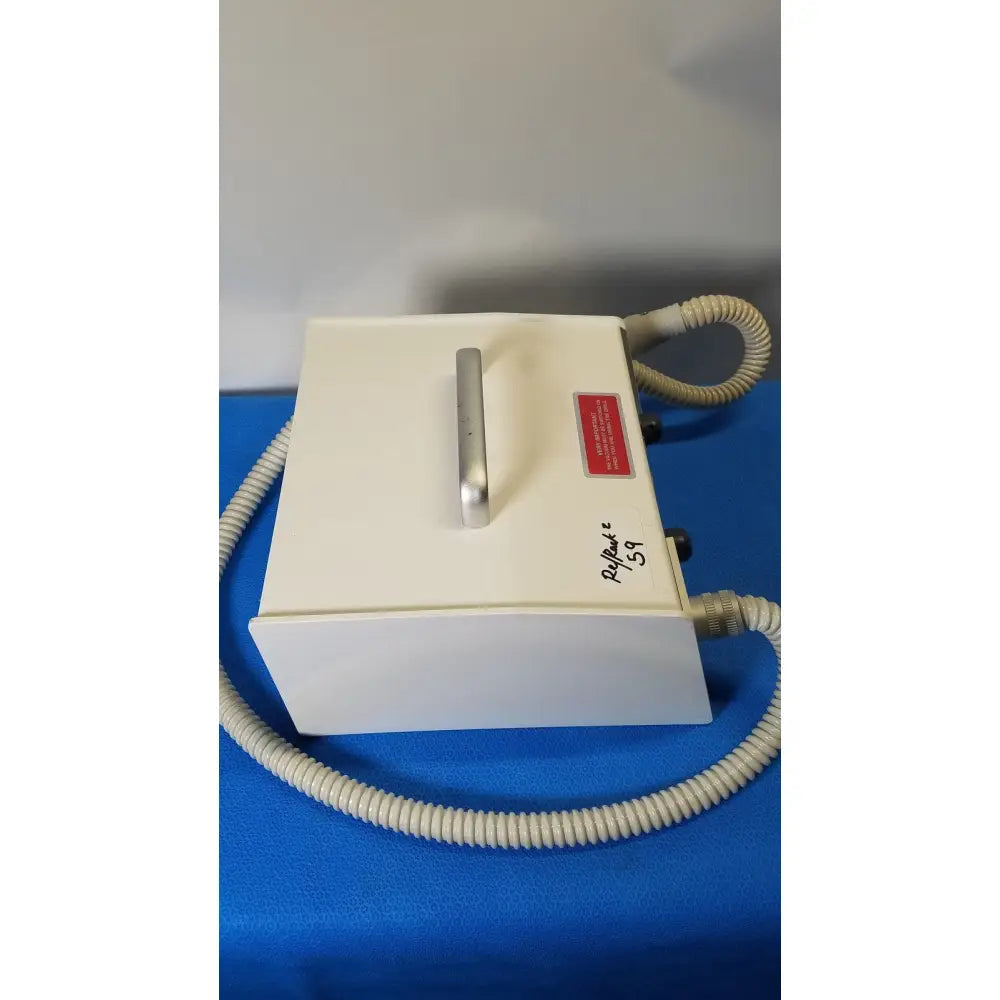 White rectangular medicool pro vac file v2 dust collector vacuum system with silver handle and beige coiled cables