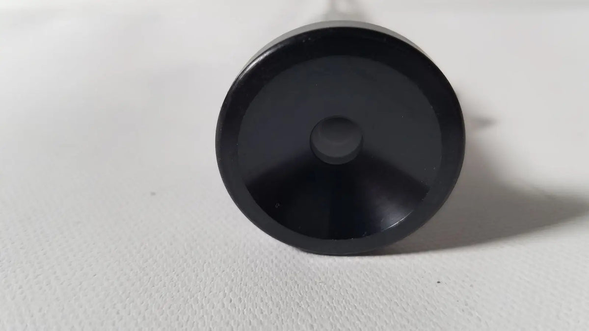 Black circular plastic cap with central hole for medifix autoclave d-5540 30 degree endoscope accessory