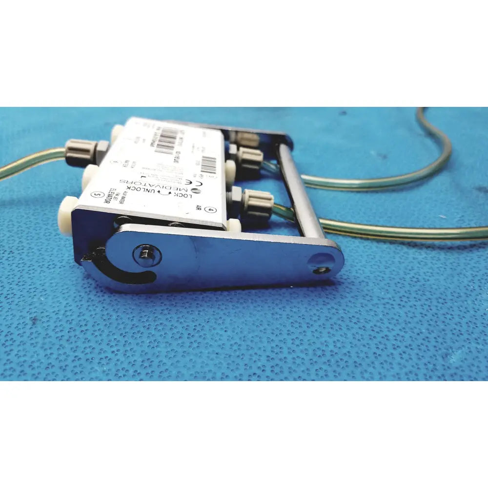 Blue metallic medivators 907315 hook-up connector assembly with white labeling and green cables for reuse medical use