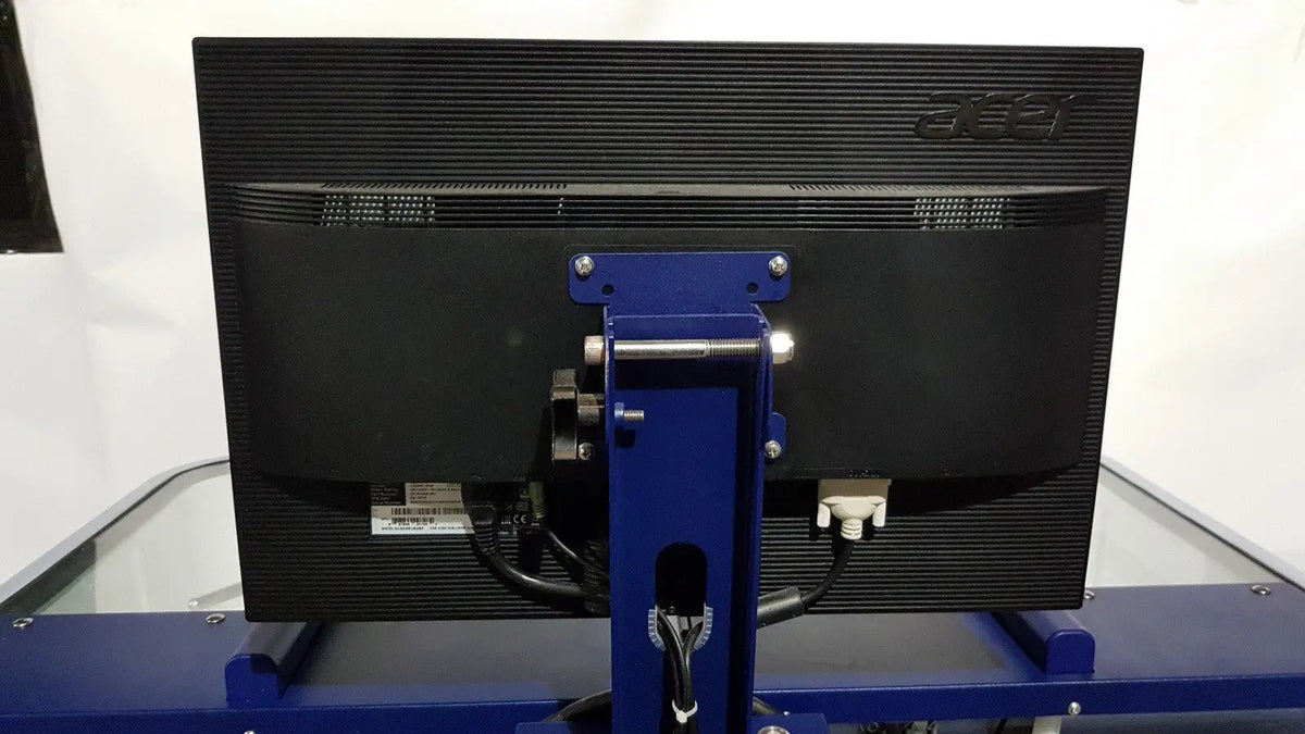 Black acer monitor mounted on blue stand in medivators advantage plus endoscope reprocessor system setup