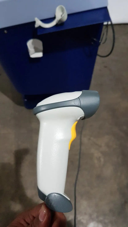 White and gray handheld barcode scanner with yellow trigger for medivators advantage plus endoscope reprocessor system