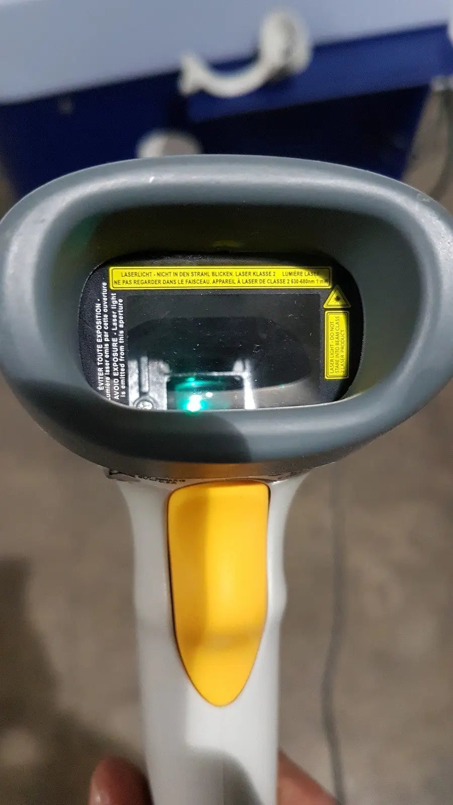 Gray and yellow handheld barcode scanner with green laser indicator for medivators advantage plus endoscope reprocessor system