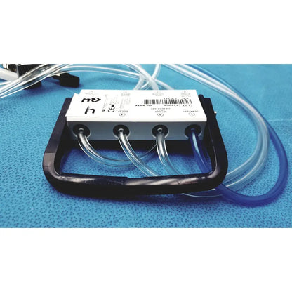 Black plastic handle with white control unit and transparent tubing medivators hook-up block compatible component