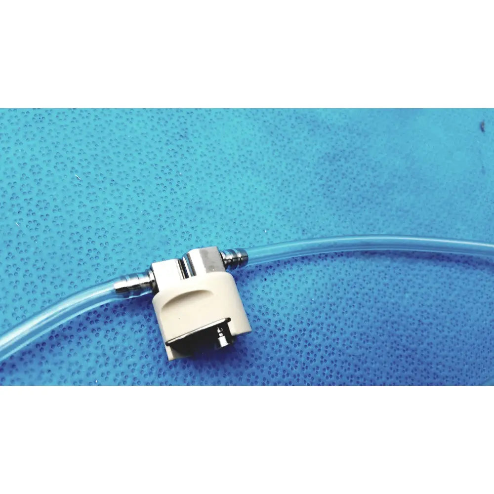Clear plastic tube with beige and metallic connector for medivators hook-up block compatible component block unit