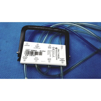 White plastic medivators hook-up connector assembly 950627 with black frame and labeled ports for air suction and balloon gas
