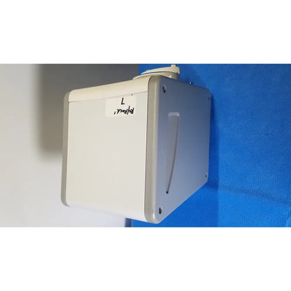 Beige and gray wall-mounted medical device with small side handle medivators sbp-100 scope buddy plus