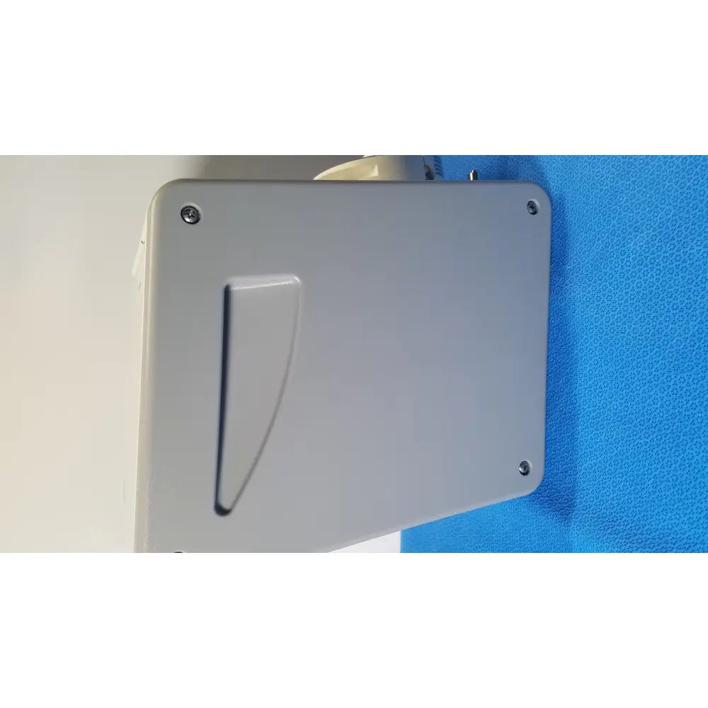Gray rectangular wall-mounted Medivators scope buddy plus device with recessed handle and four corner screws visible from the back