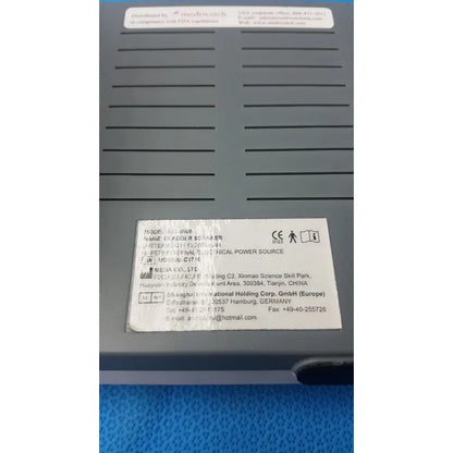 Gray plastic mediwatch md-6000 bladder scanner showing white label with technical specifications and manufacturer information
