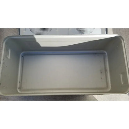 Gray plastic storage bin with a perforated lid used with medline aluminum storage and sterilization container
