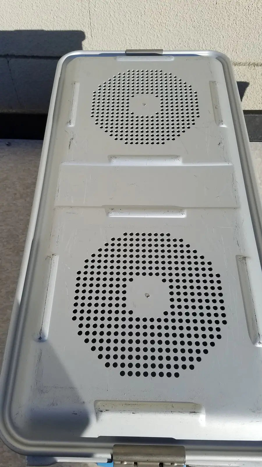 Silver metallic aluminum laptop cooling pad with two circular vents and sturdy rectangular design for medline aluminum storage