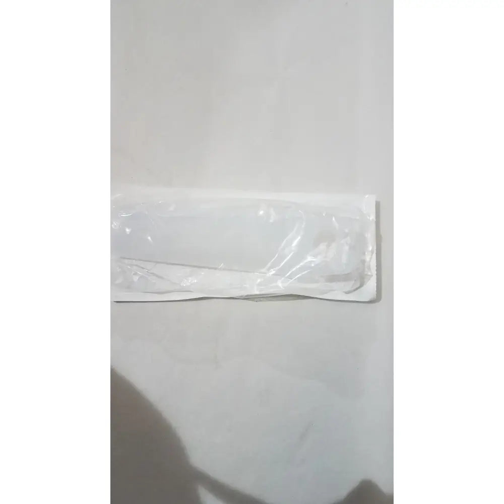 White rectangular sterile medline electrosurgical safety holster esh1 wrapped in clear plastic packaging for secure tool holding
