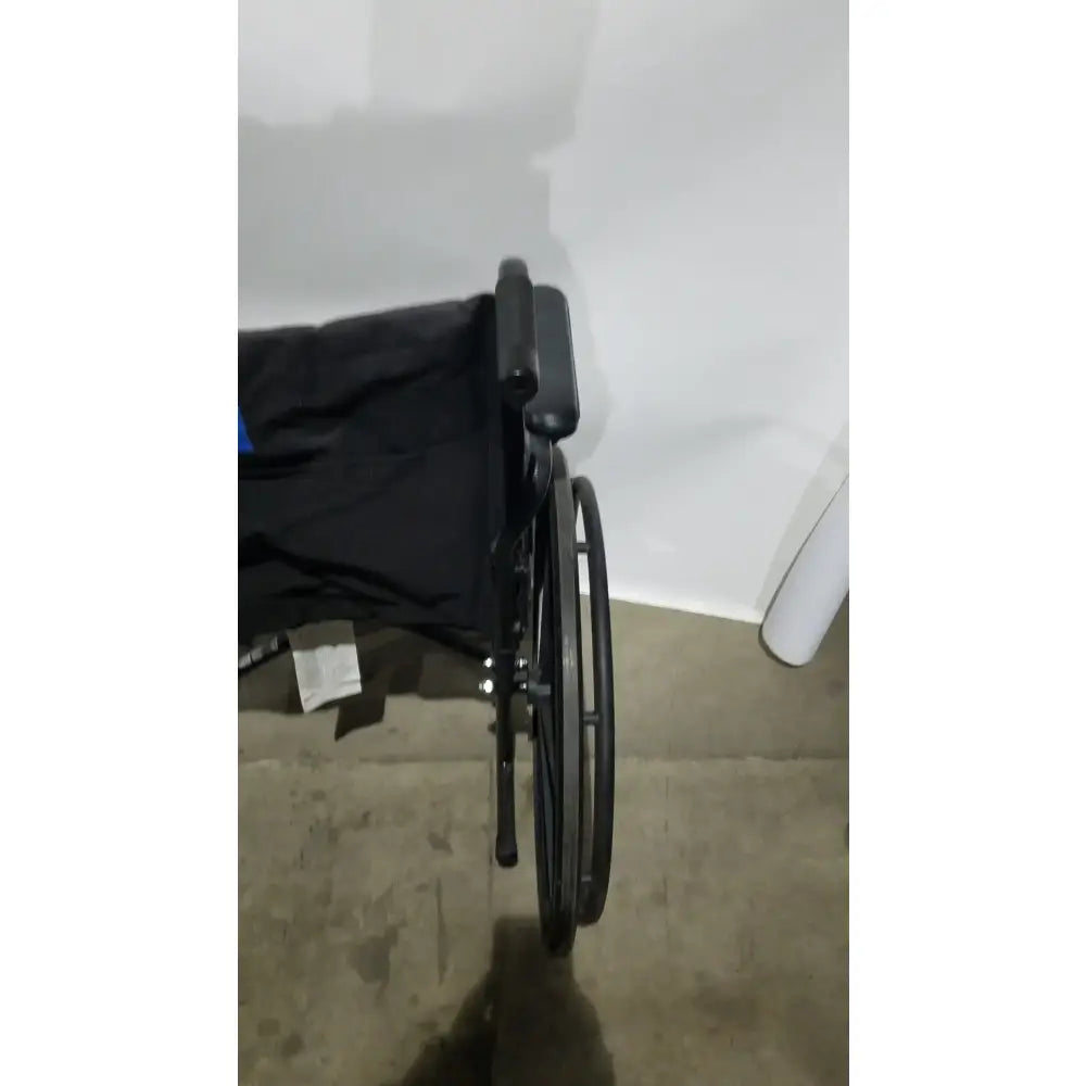 Reuse Medical Equipment Medline Guardian Standard Manual Wheelchair with Padded Arms and Durable Folding Frame Wheelchairs, second-hand product photo 2