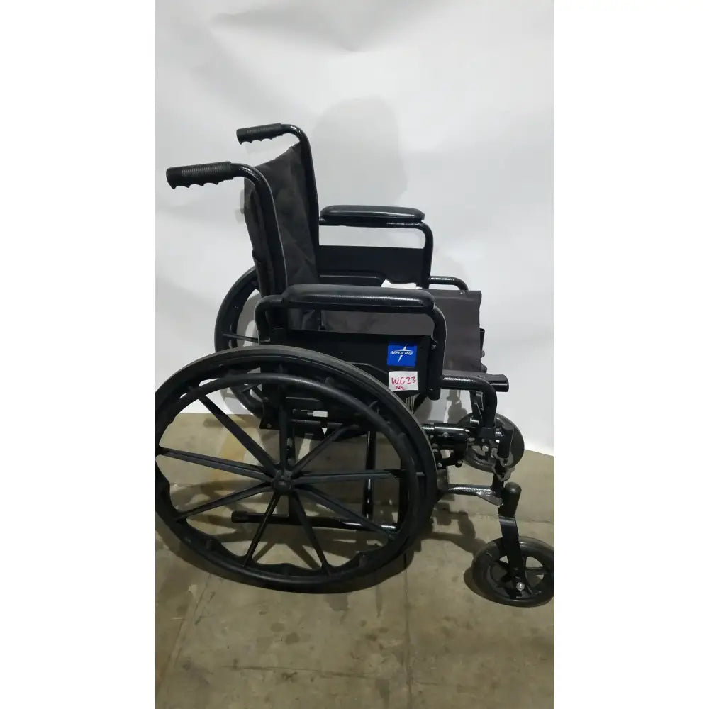 Reuse Medical Equipment Medline Guardian Standard Manual Wheelchair with Padded Arms and Durable Folding Frame Wheelchairs, second-hand product photo 1