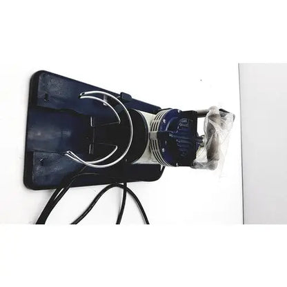 Blue and silver medline hcs 7000 suction aspirator unit air compressor mounted on black wall bracket