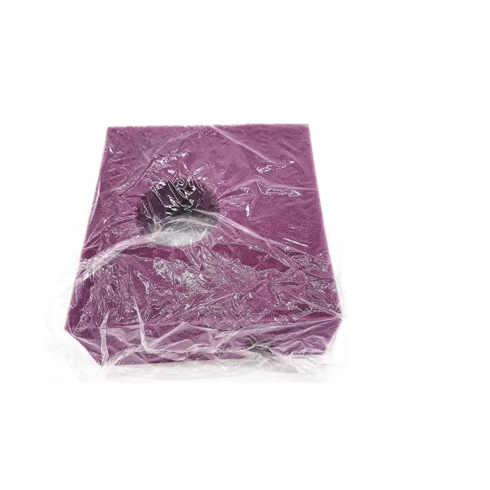 Medline non081143 slotted purple rectangular foam head positioner wrapped in clear plastic for patient support