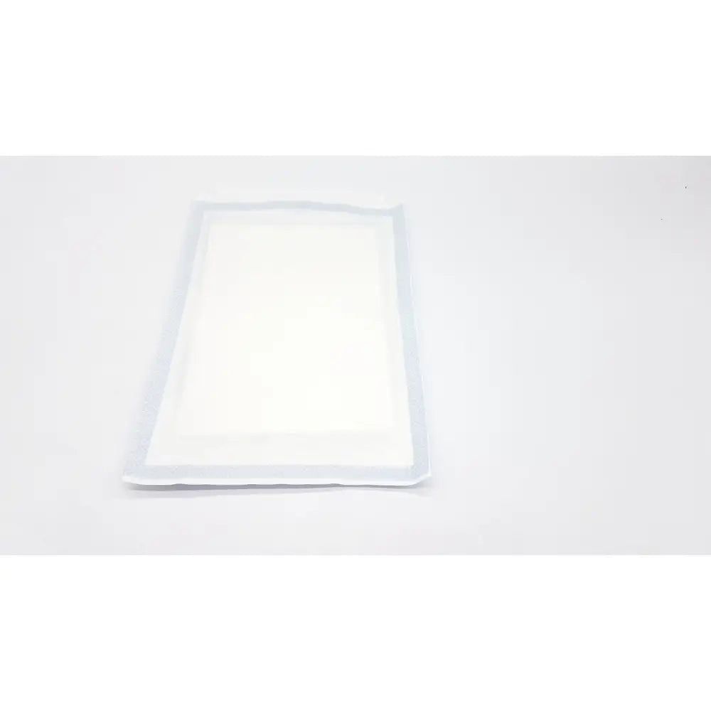 White rectangular adhesive pad with translucent border for medline drape drap multilignes non21003 18 x 26in