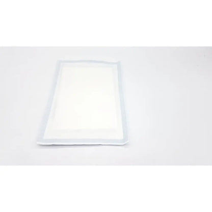 White rectangular adhesive pad with translucent border for medline drape drap multilignes non21003 18 x 26in