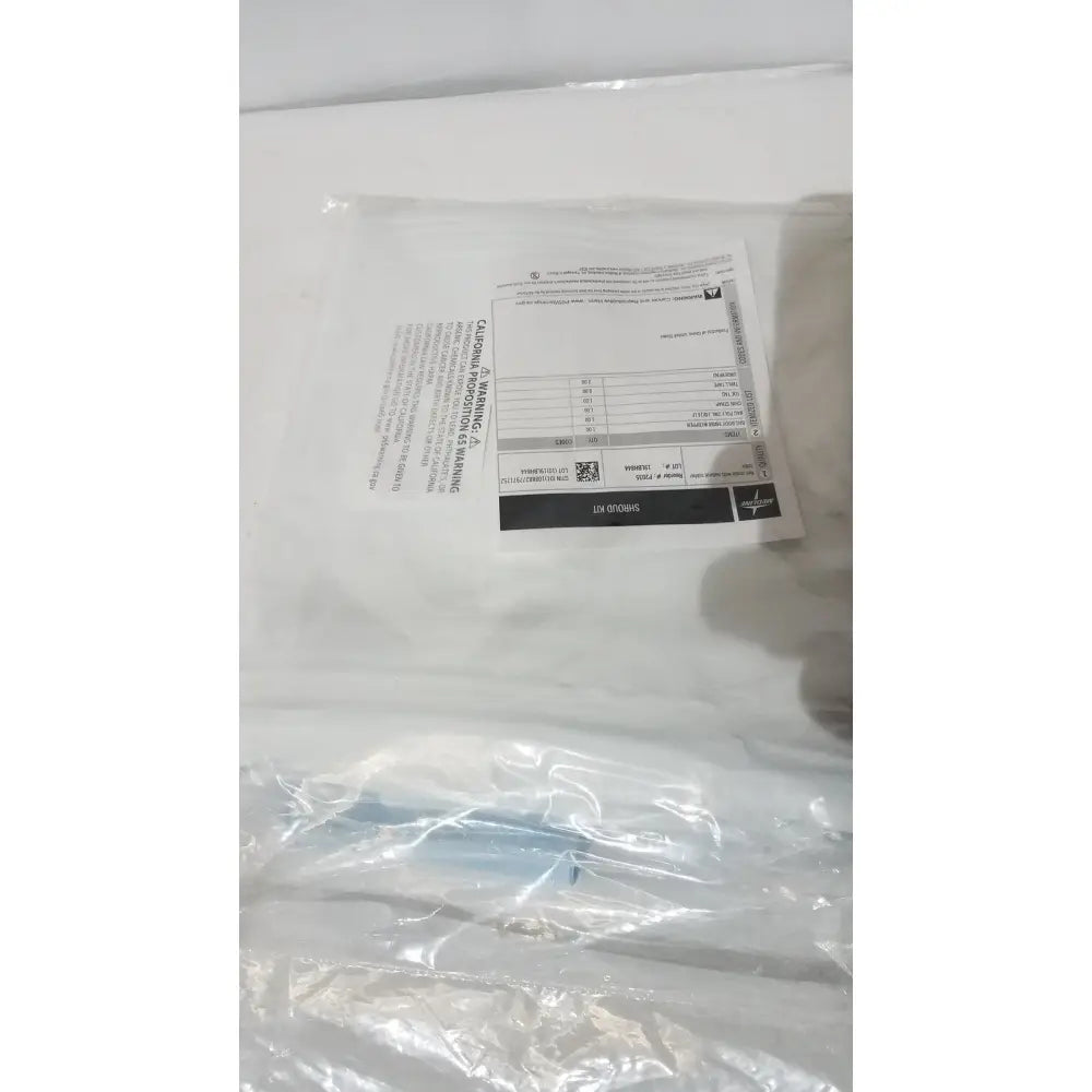 A white heavy duty disposable medline post mortem body bag with a printed label and qr code on the back side