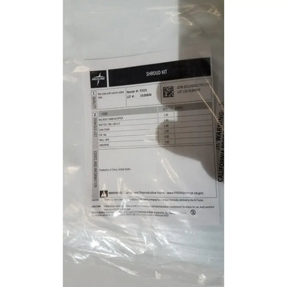 A clear plastic bag contains a medline post mortem heavy duty disposable white body bag kit with product labels