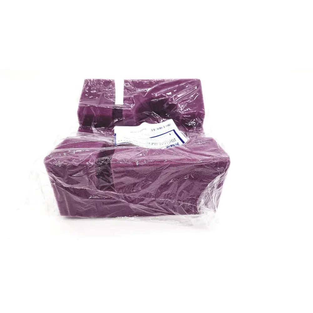 Purple rectangular tissue box wrapped in clear plastic as medline single use slotted foam head positioner packaging