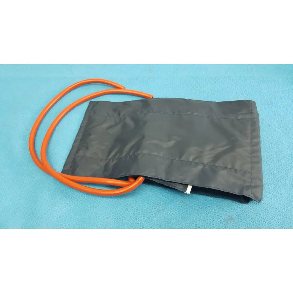 Black fabric medline sphygmomanometer artery large adult blood pressure cuff with orange tubing for accurate monitoring