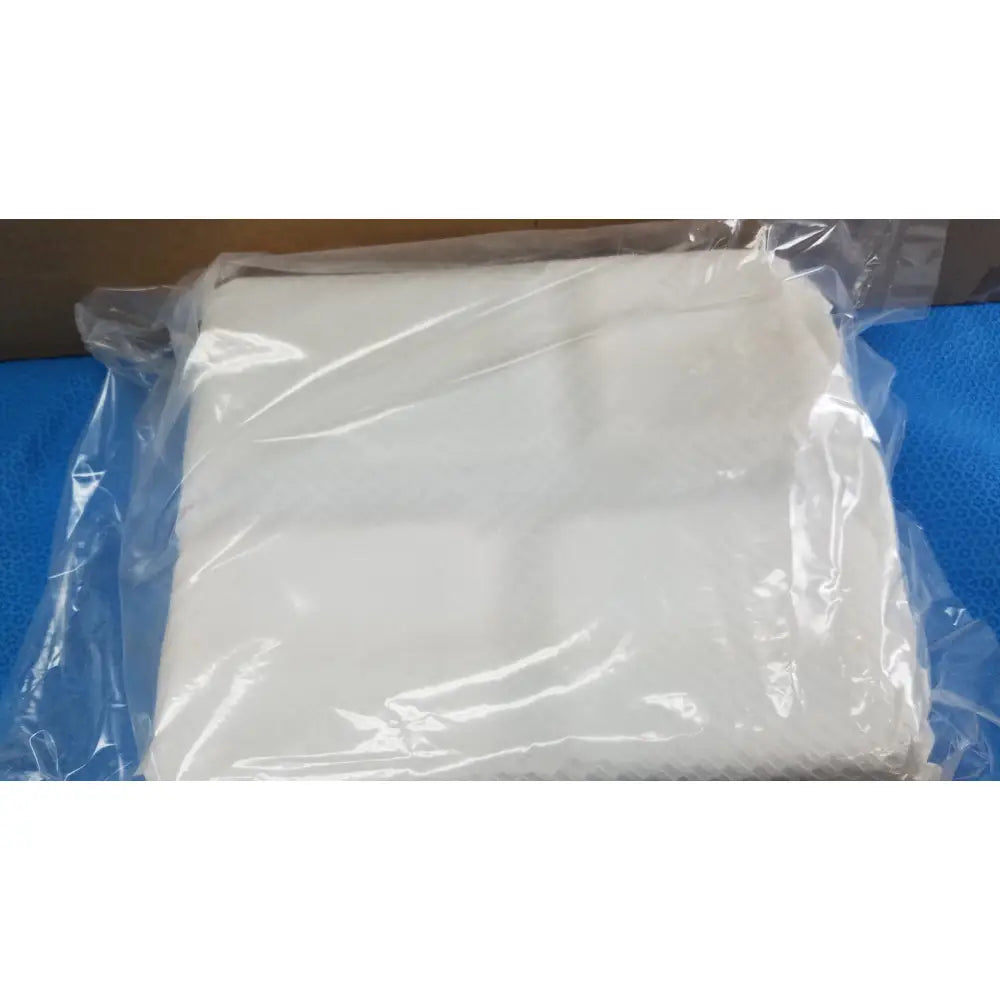 Medline wet skin prep tray with white soft-textured cloth wrapped in clear plastic packaging for wet skin prep use