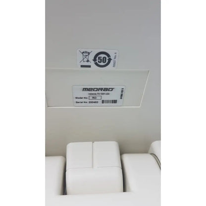 White medrad ra 1500i usa model x-ray imaging device with sleek rectangular design on medrad mark v provis injector control panel power console