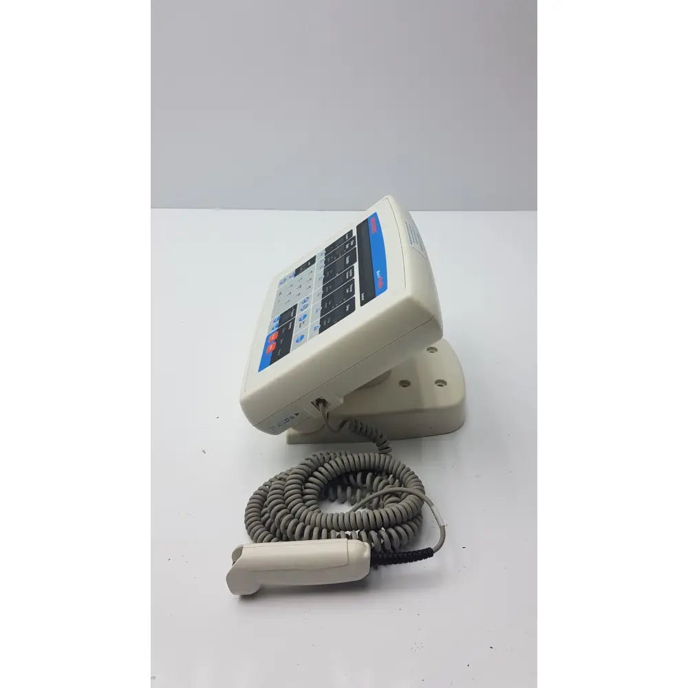 Beige medrad mark v provis rd injector control panel with coiled gray cable and handheld control panel power console