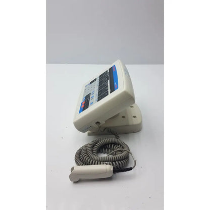 Beige medrad mark v provis rd injector control panel with coiled gray cable and handheld control panel power console
