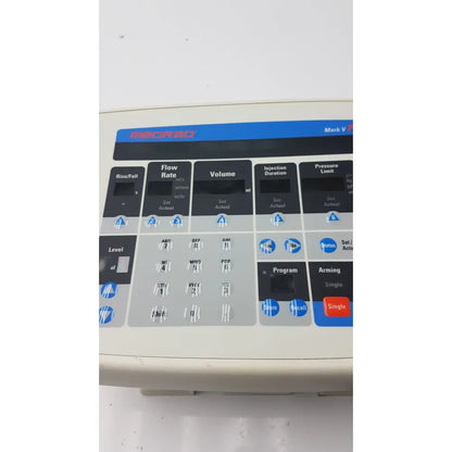Beige medrad mark v provis rd medical infusion pump with blue and black injector control panel power console