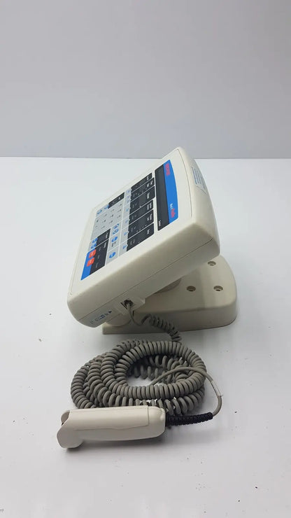 Beige medrad mark v provis rd injector control panel with coiled gray cable and handheld control panel power console