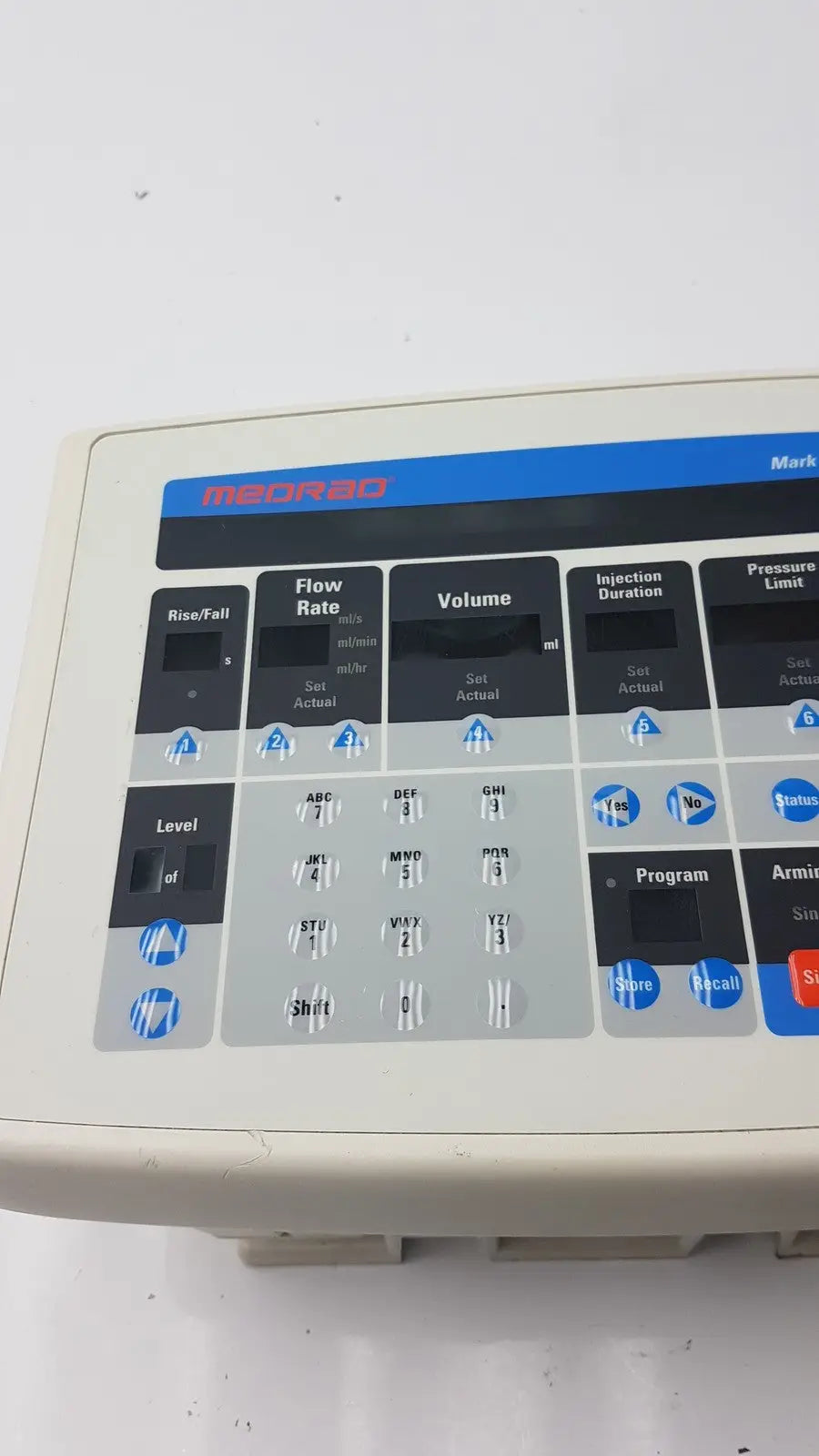 Beige plastic Medrad Mark V ProVis RD injector control panel with blue and black labeled buttons for panel power console