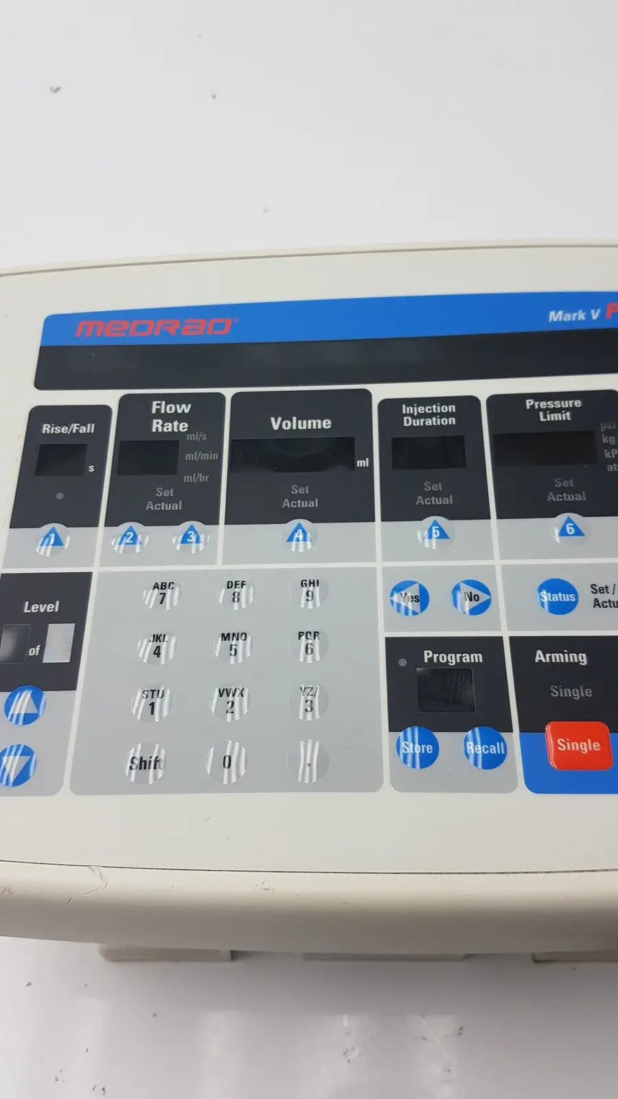 Beige medrad mark v provis rd medical infusion pump with blue and black injector control panel power console