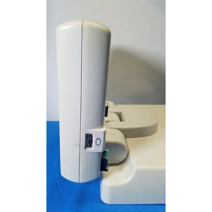 White plastic medrad spectris solaris ep mr contrast injector system monitor showing usb port and power button on its side