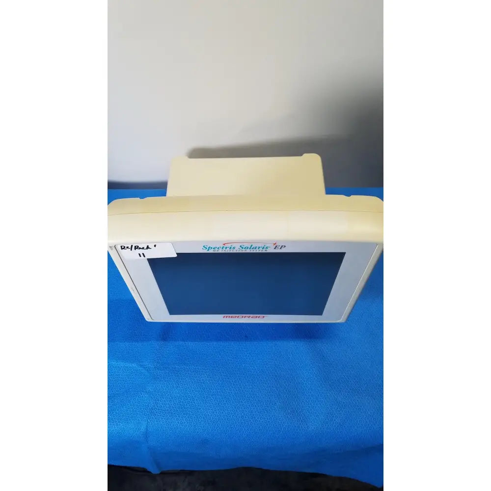 Beige plastic medrad spectris solaris ep touchscreen panel with white bezel and blue screen for contrast injector system monitor