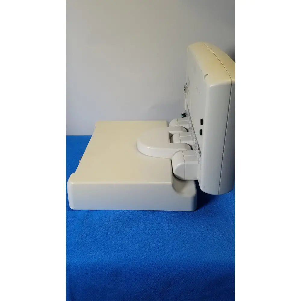 Cream-colored plastic baby monitor with sleek rounded edges from medrad spectris solaris ep mr contrast injector system