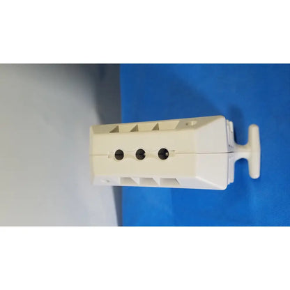 White plastic wall-mounted electrical outlet cover with three circular cutouts for medrad spectris solaris mr injection system battery