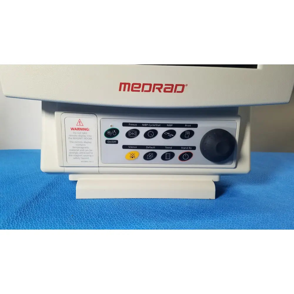 White medrad veris monitoring system with black button control panel, large black dial, and red medrad veris branding