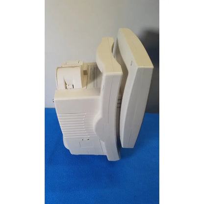 Cream-colored plastic crt monitor with curved screen and side ventilation slats for Medrad Veris monitoring system
