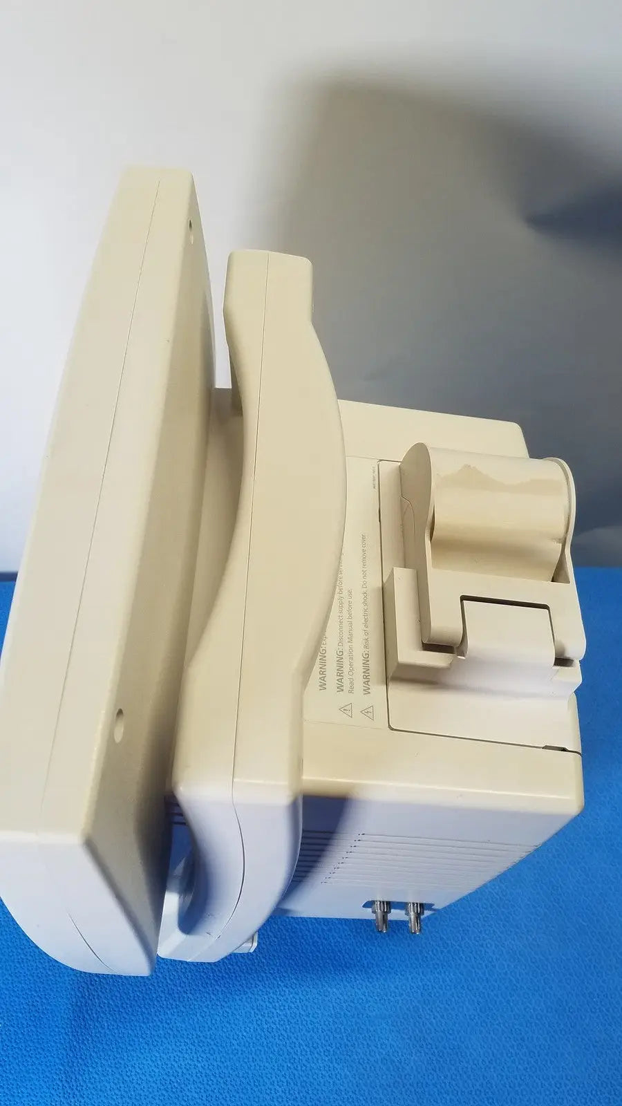 Beige plastic medrad veris monitoring system ultrasound machine with curved screen and control panel for medical use