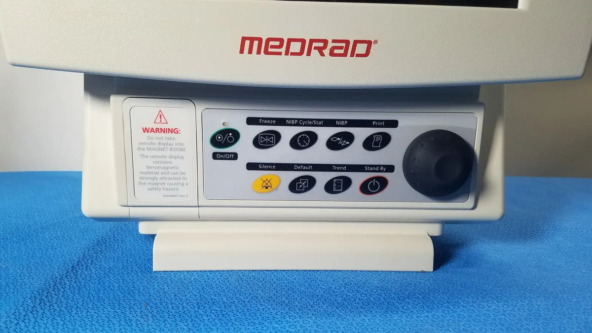 White medrad veris monitoring system with black button control panel, large black dial, and red medrad veris branding