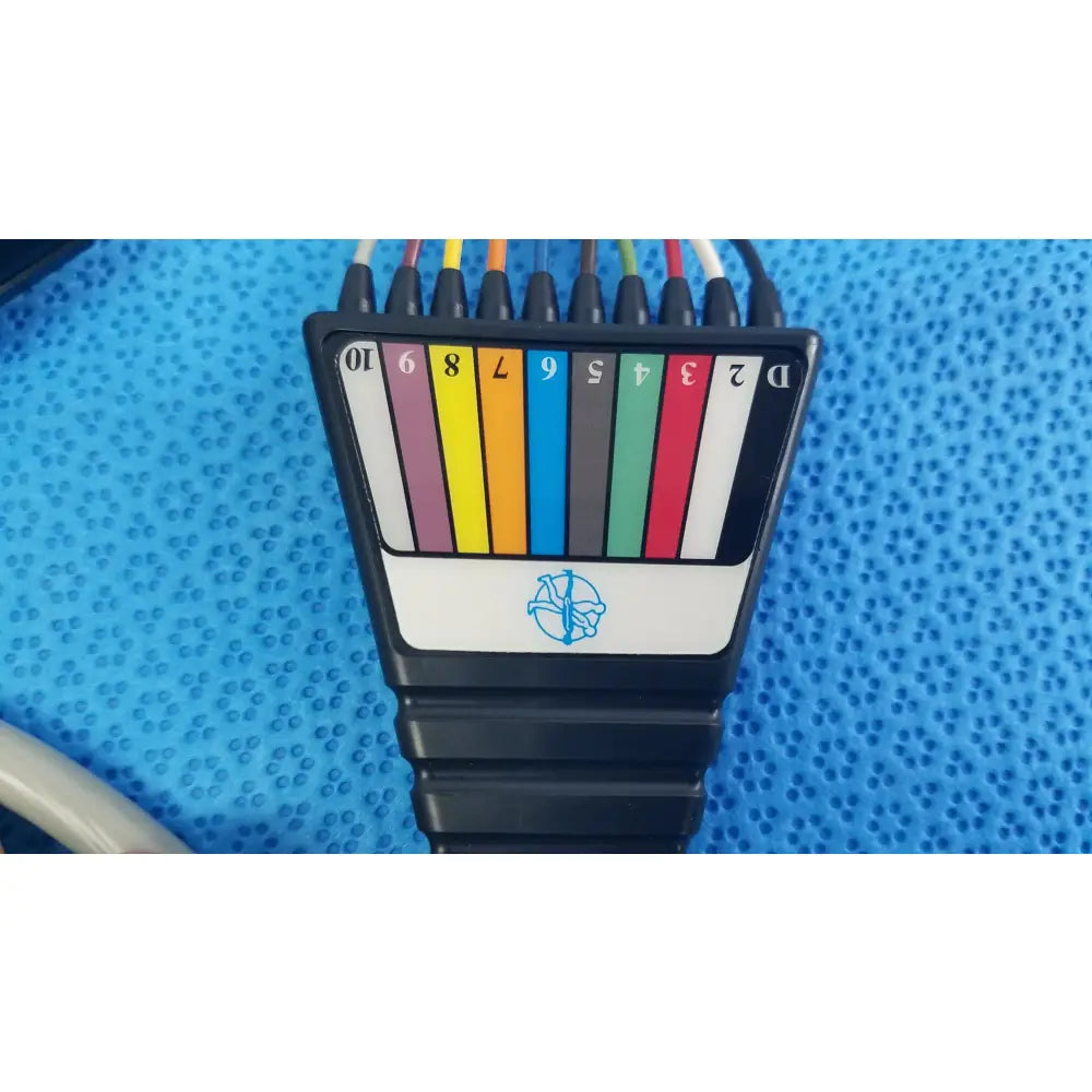 Black plastic ethernet cable tester with color-coded ports and blue logo for medtronic 2achc catheter ecg medical equipment