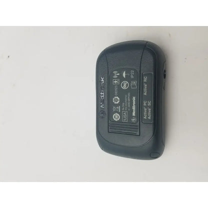 Black medtronic activa rc wireless insulin pump with matte finish and rounded edges for dbs patient programmer reuse medical use