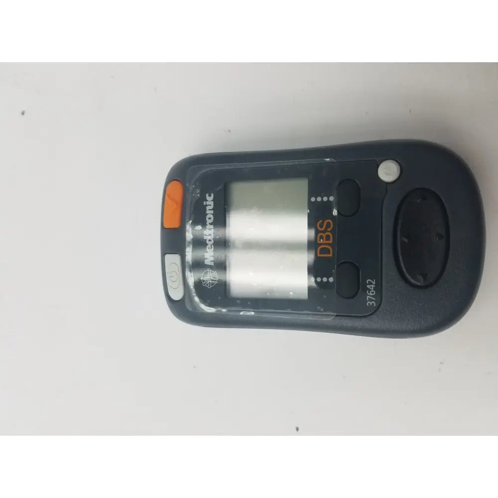 Black mettler-toledo dbs patient programmer with orange and gray buttons digital display and model number 37642 visible