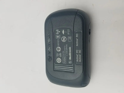Black medtronic activa pc sc wireless receiver with rounded edges textured surface for dbs patient programmer reuse medical use