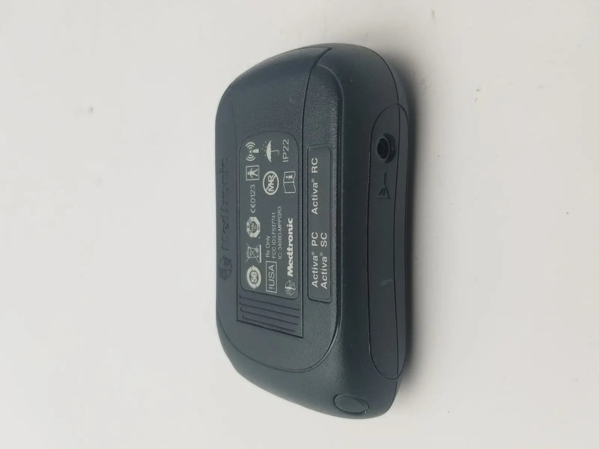 Black medtronic activa rc insulin pump with matte finish and rounded edges for dbs patient programmer reuse medical use
