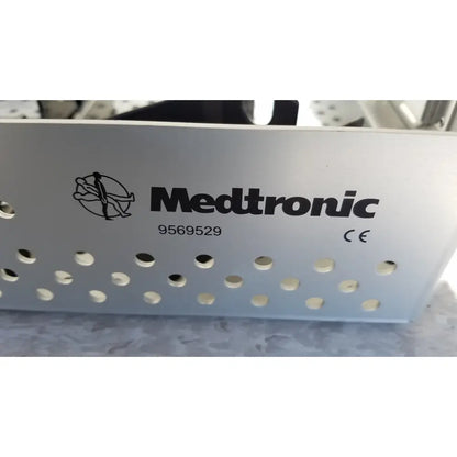 Silver perforated metal dilators tray with Medtronic branding model 9569529 for reuse medical sterilization trays
