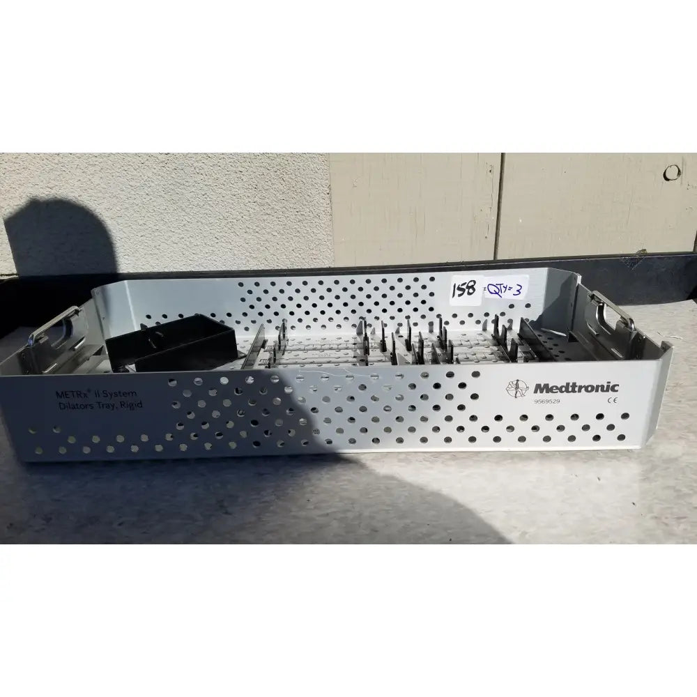 Silver perforated metal dilators tray branded medtronic for reuse medical sterilization trays metrx ii system rigid